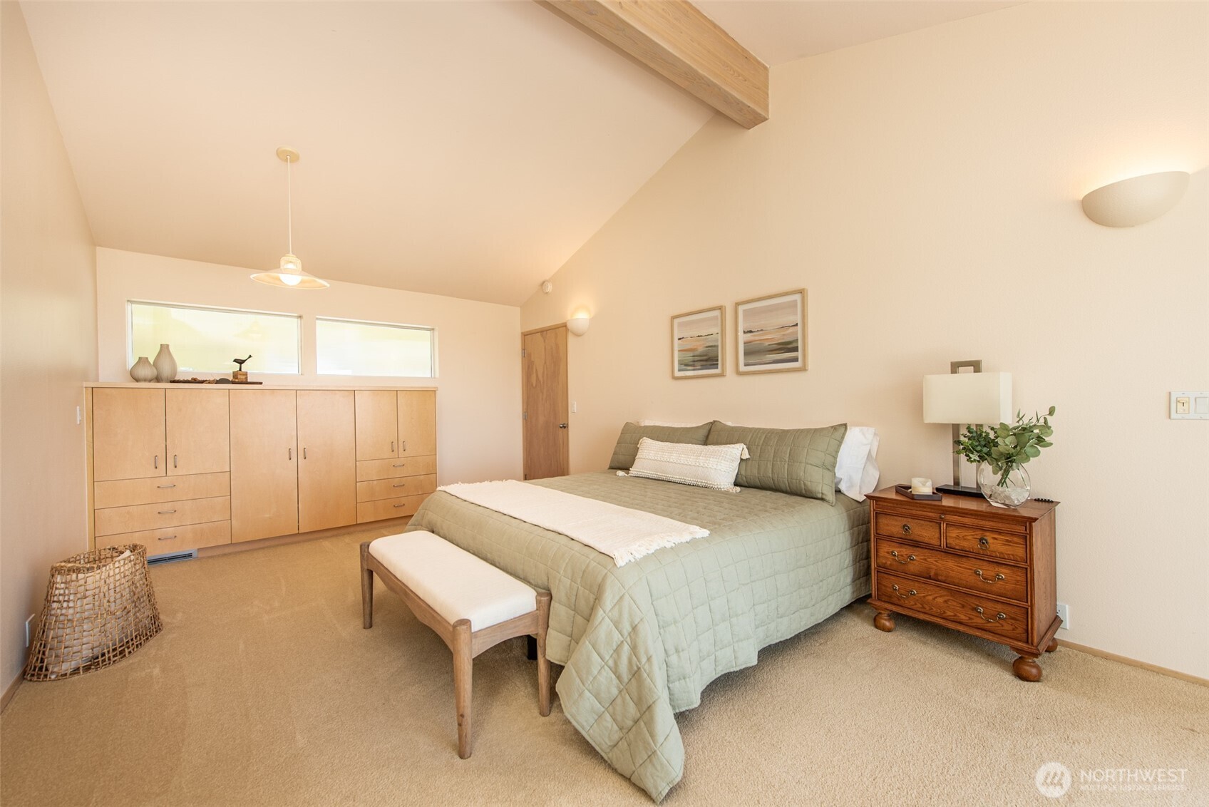 322 Ravens Ridge Road Sequim, WA 98382 - Photo 19 of 40 a bedroom with a bed and a table