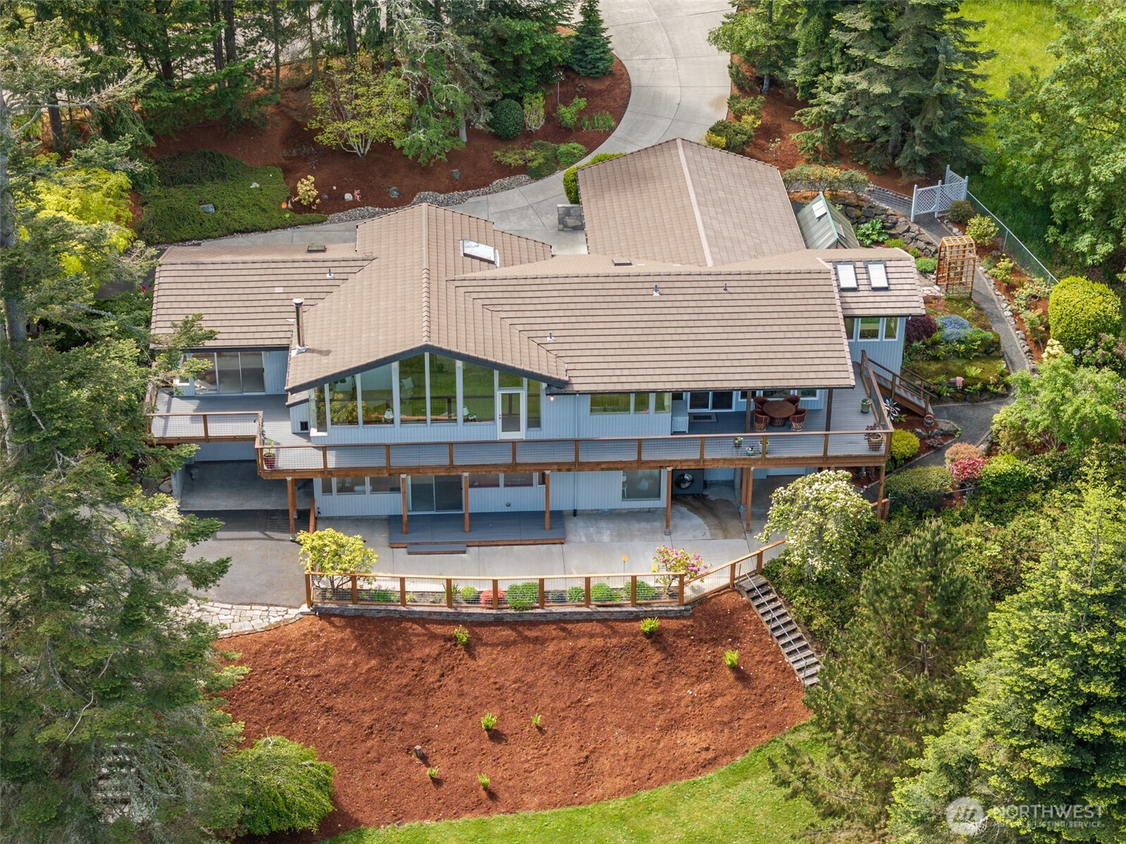 322 Ravens Ridge Road Sequim, WA 98382 - Photo 2 of 40 an aerial view of a house with swimming pool and porch
