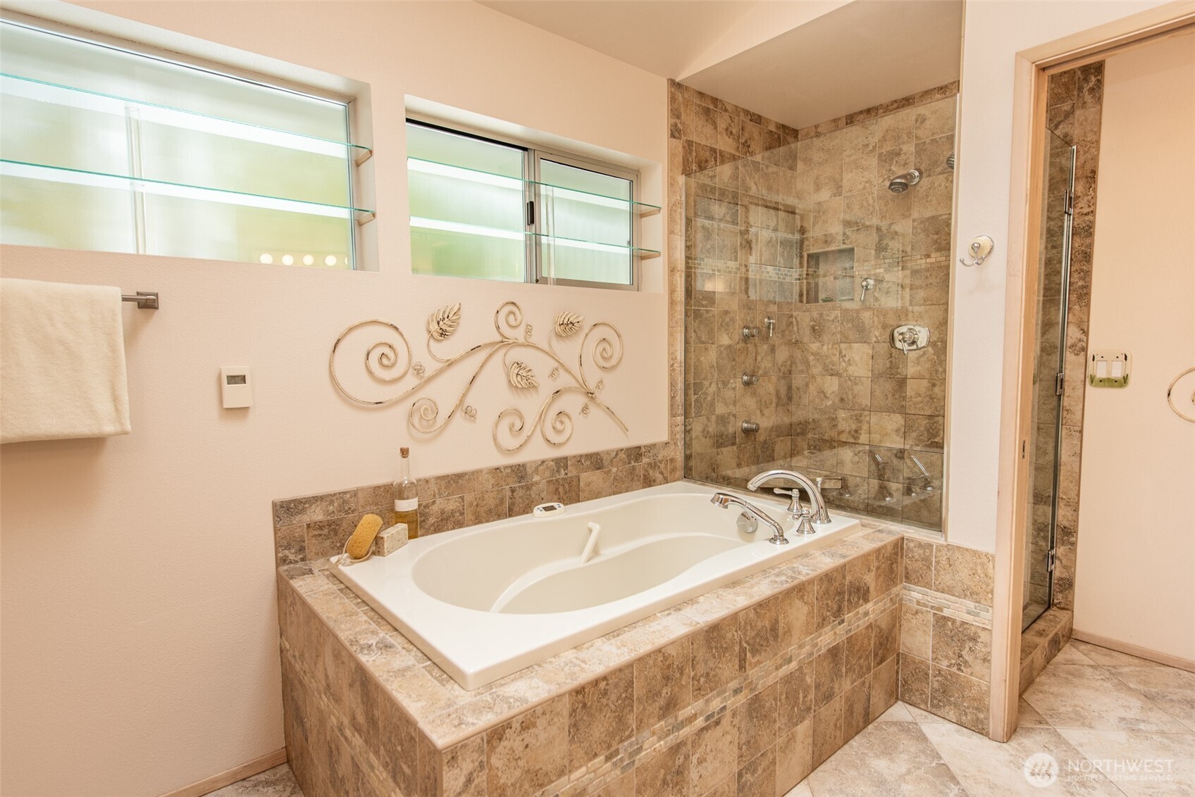 322 Ravens Ridge Road Sequim, WA 98382 - Photo 21 of 40 a bathroom with a sink and a bathtub