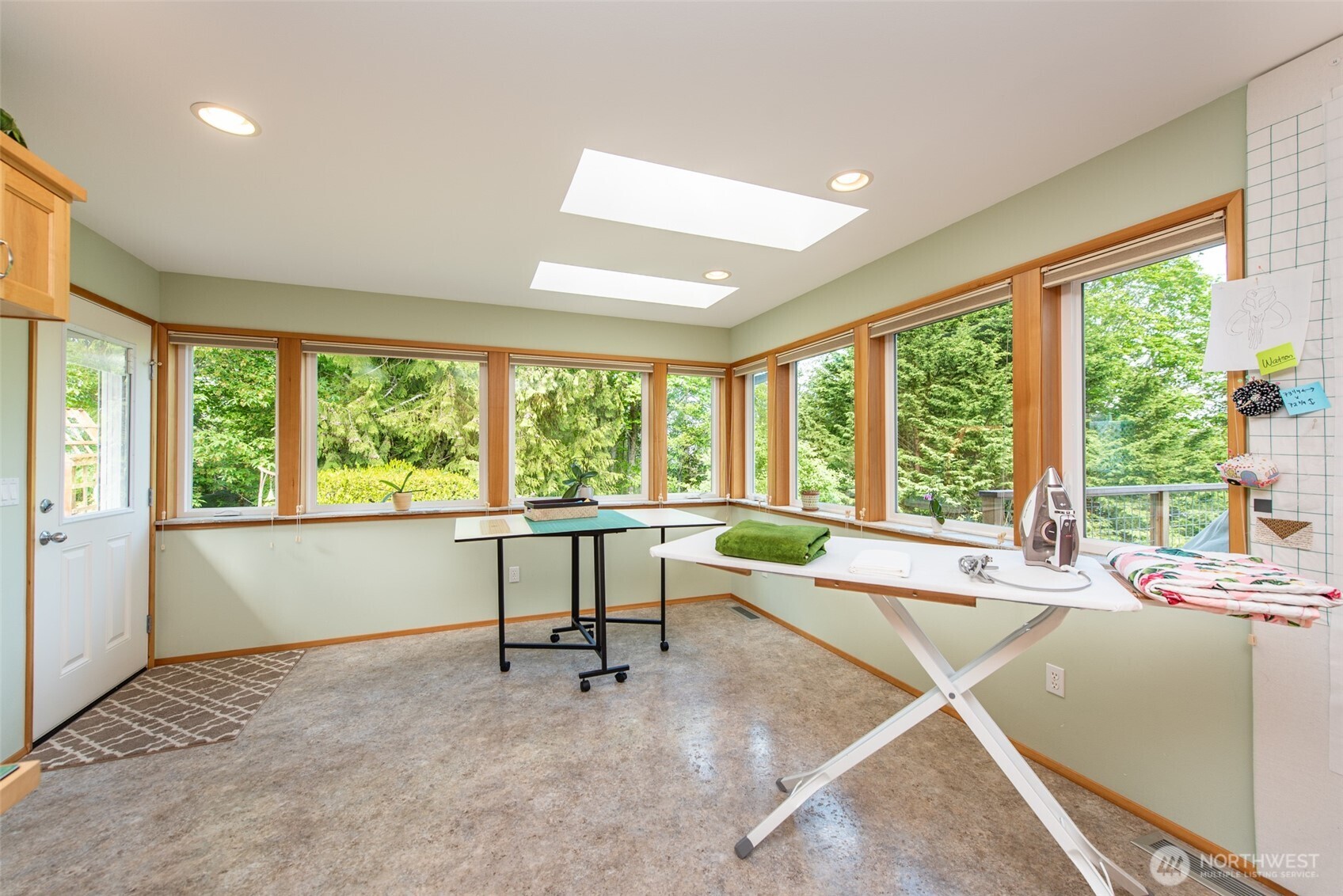 322 Ravens Ridge Road Sequim, WA 98382 - Photo 22 of 40 a living room with furniture and a large window