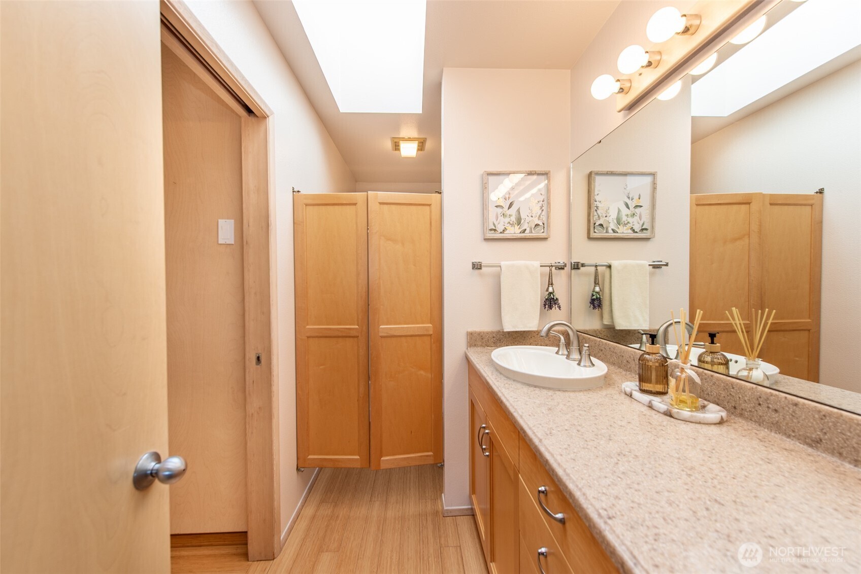 322 Ravens Ridge Road Sequim, WA 98382 - Photo 23 of 40 a bathroom with a sink double vanity granite tub shower and mirror