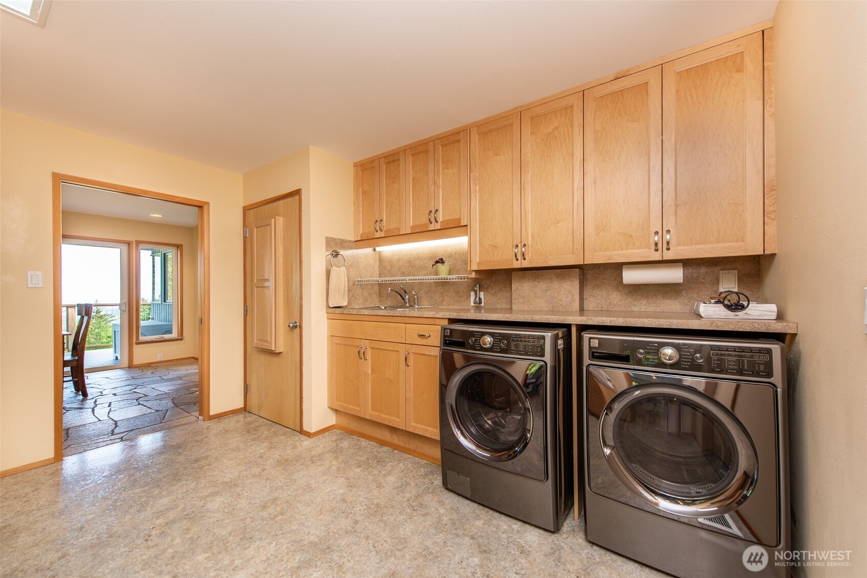 322 Ravens Ridge Road Sequim, WA 98382 - Photo 24 of 40 a view of a kitchen with washer and dryer