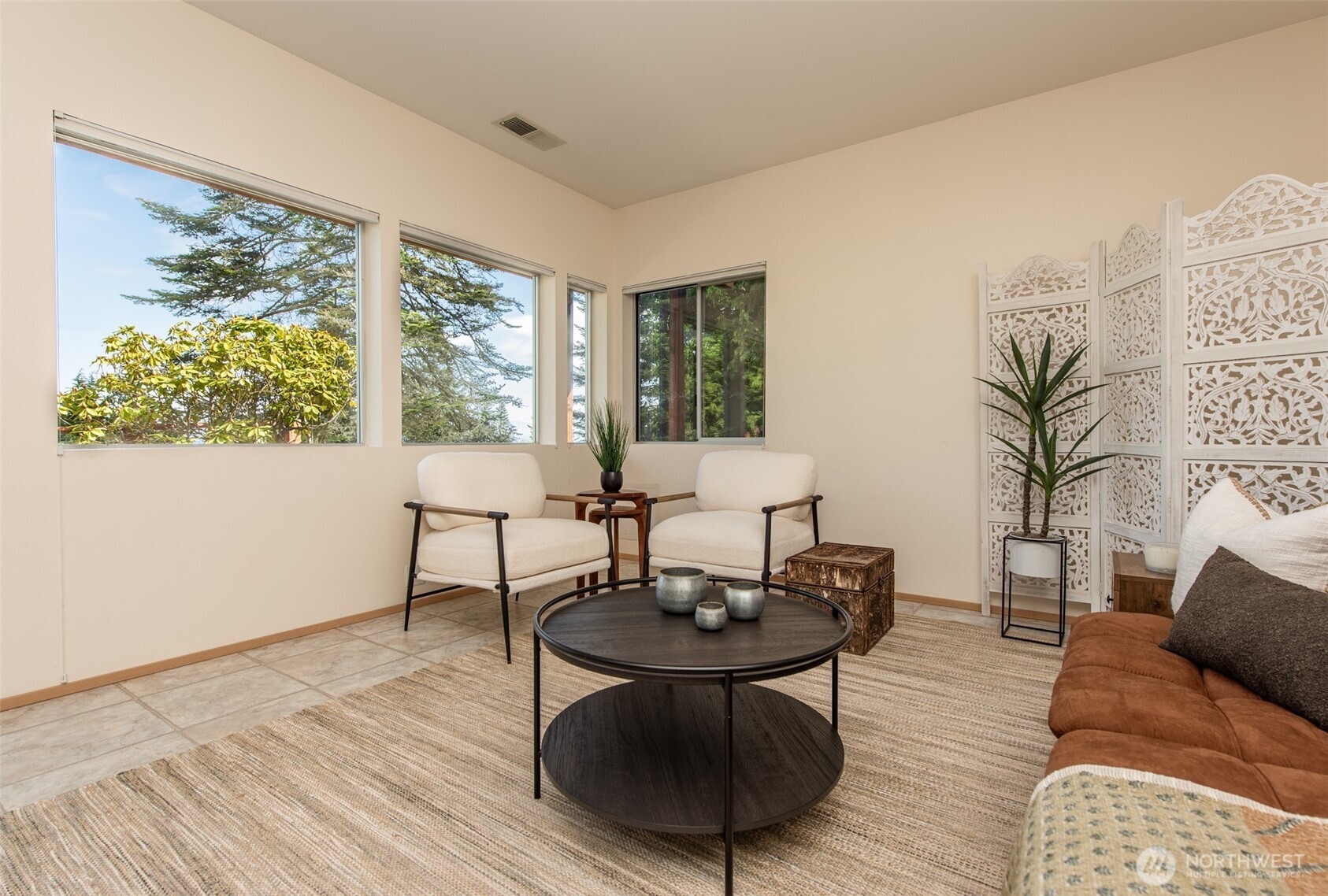322 Ravens Ridge Road Sequim, WA 98382 - Photo 28 of 40 a living room with furniture and a table
