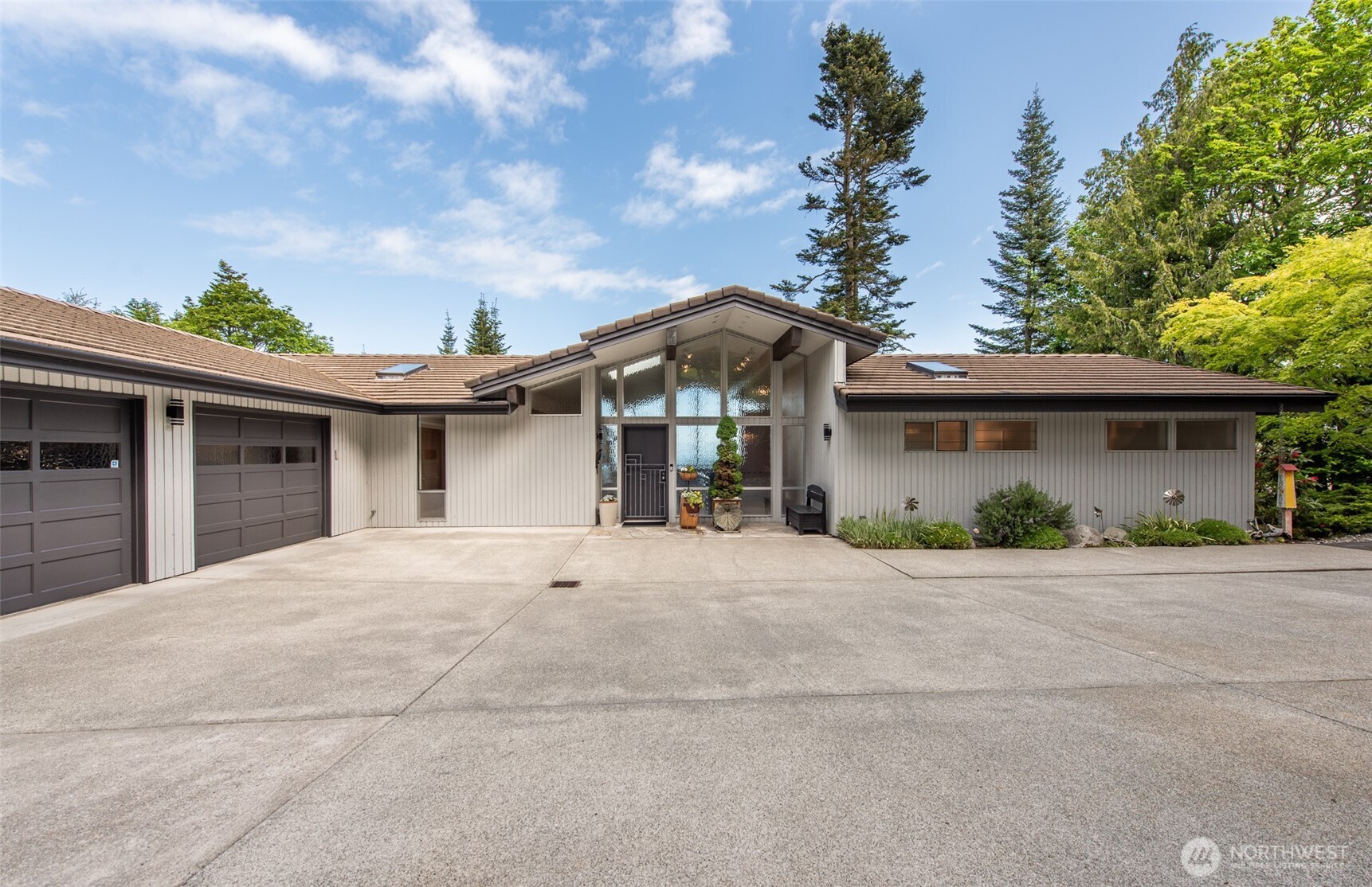 322 Ravens Ridge Road Sequim, WA 98382 - Photo 3 of 40 front view of a house with a outdoor space