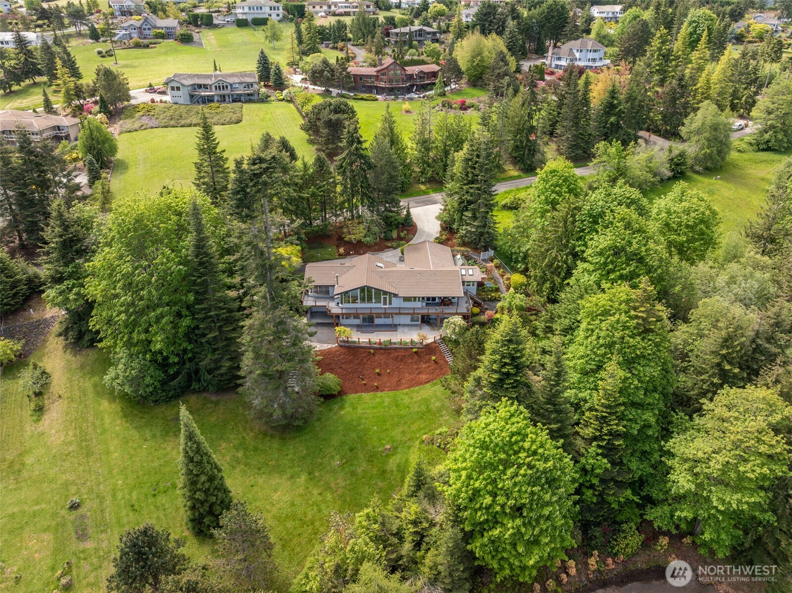 322 Ravens Ridge Road Sequim, WA 98382 - Photo 40 of 40 a view of a lake with houses