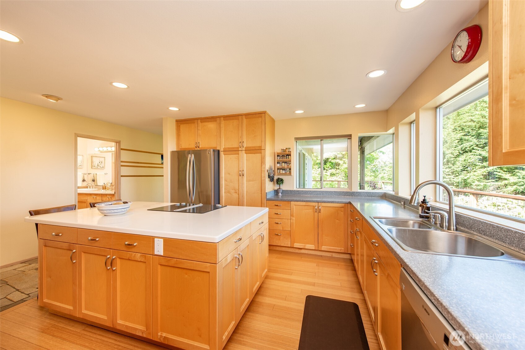 322 Ravens Ridge Road Sequim, WA 98382 - Photo 10 of 40 a kitchen with a sink and a large window