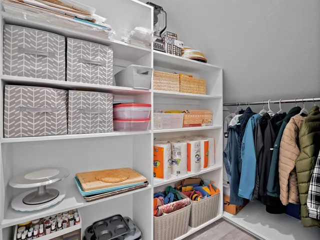 a room with furniture and a window