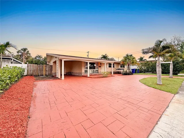 a view of house with yard outdoor seating and entertaining space