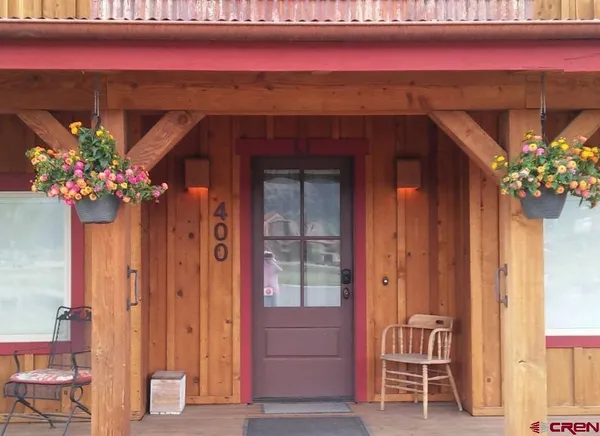 a front view of a house with a porch
