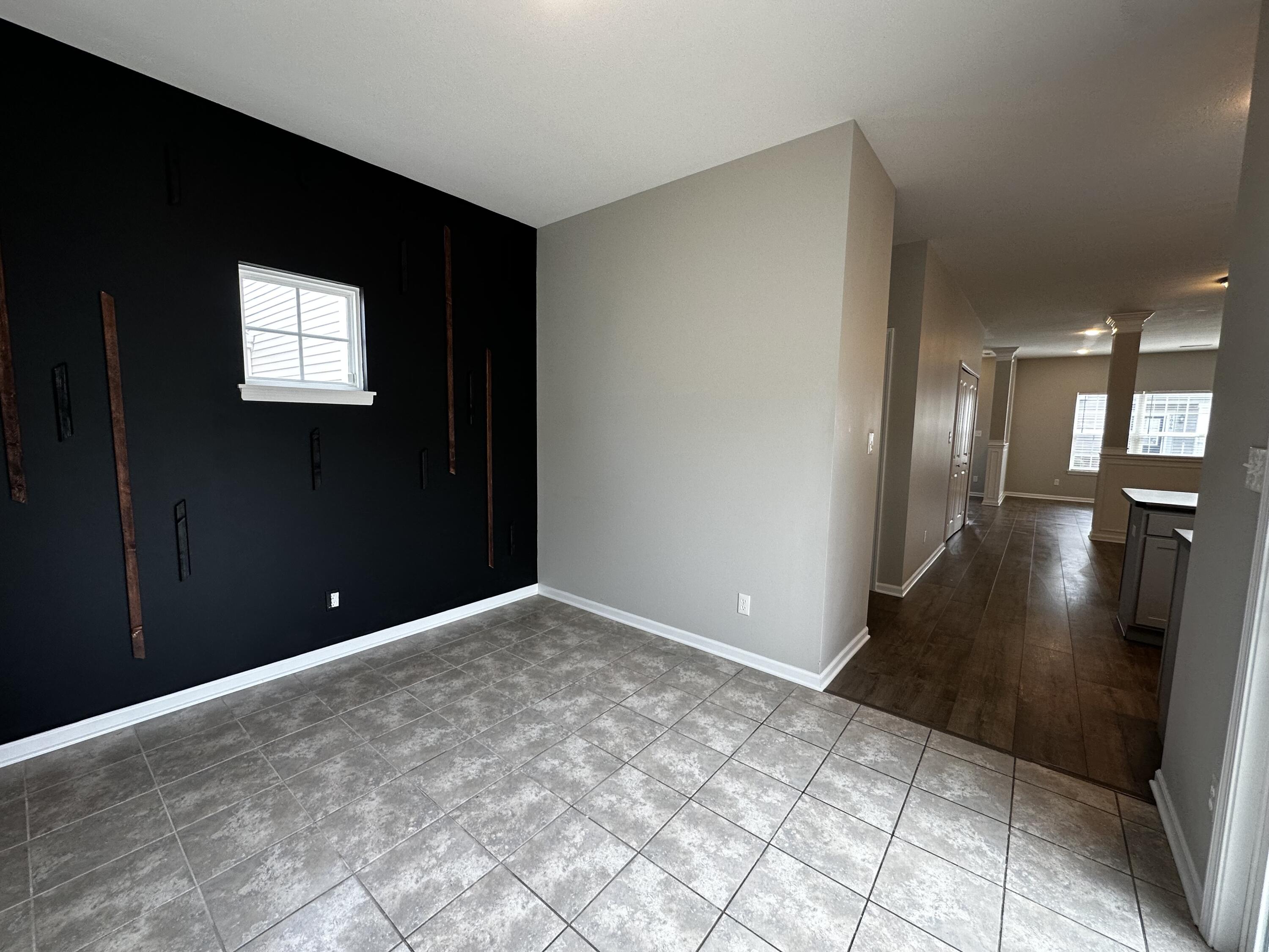 1077 East 115th Lane Crown Point, IN 46307 - Photo 7 of 16 a view of a hallway with an empty room