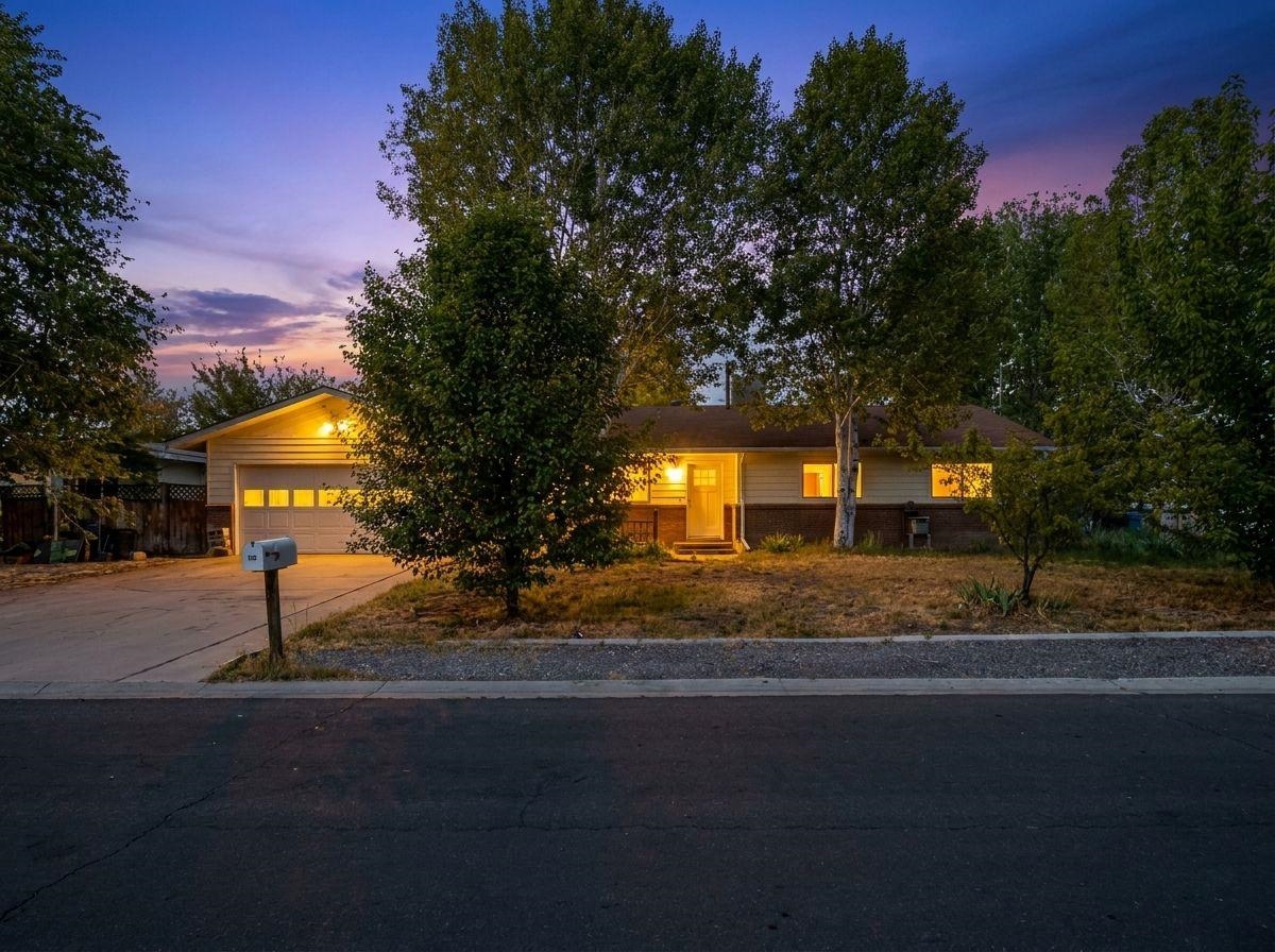 483-30 C 3/4 Road Grand Junction, CO 81504 - Photo 1 of 25 a night view of a house with street light