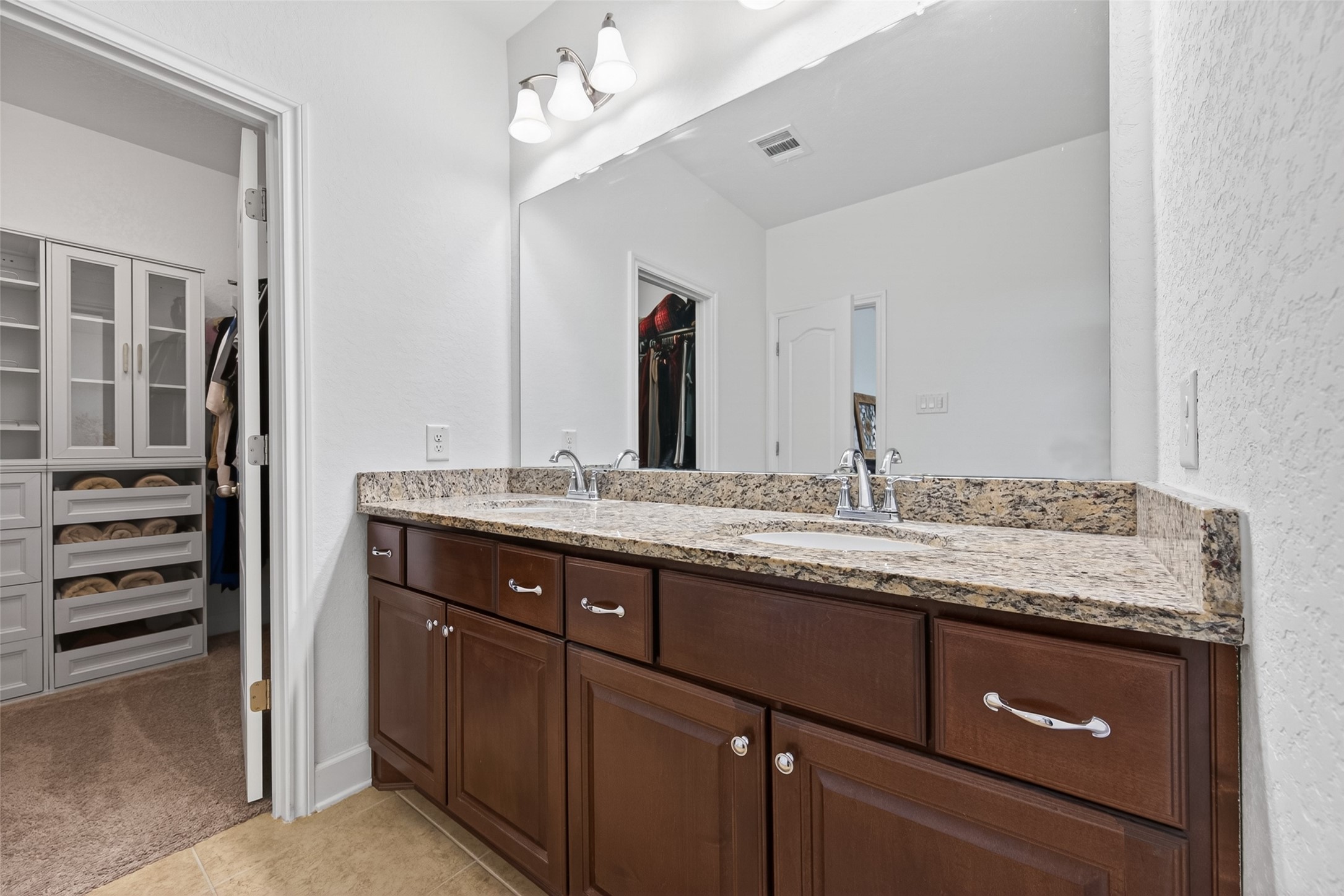 13506 Moody Road Needville, TX 77461 - Photo 20 of 36 Primary bathroom with walk in closet and storage