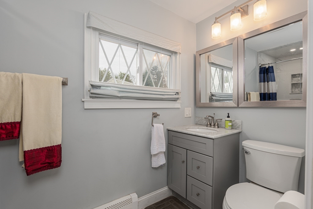 6 Hayes Avenue Beverly, MA 01915 - Photo 12 of 24 a bathroom with a toilet sink and window