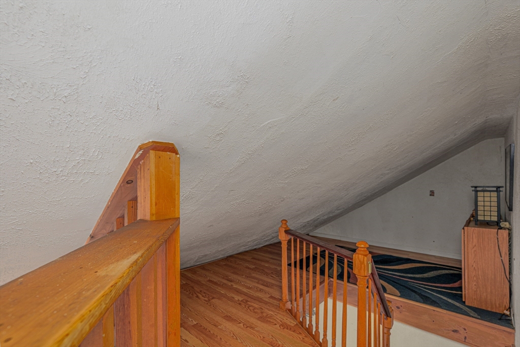 6 Hayes Avenue Beverly, MA 01915 - Photo 17 of 24 a view of staircase with wooden floor and stairs