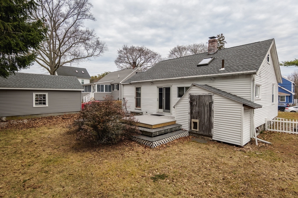 6 Hayes Avenue Beverly, MA 01915 - Photo 22 of 24 a front view of house with a garden