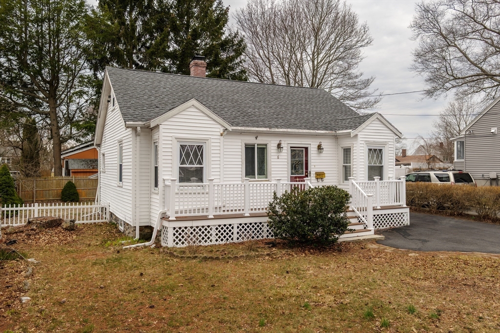 6 Hayes Avenue Beverly, MA 01915 - Photo 3 of 24 a front view of a house with a yard
