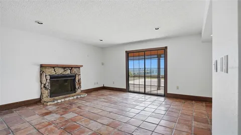 a kitchen with stainless steel appliances granite countertop a refrigerator a stove and a sink