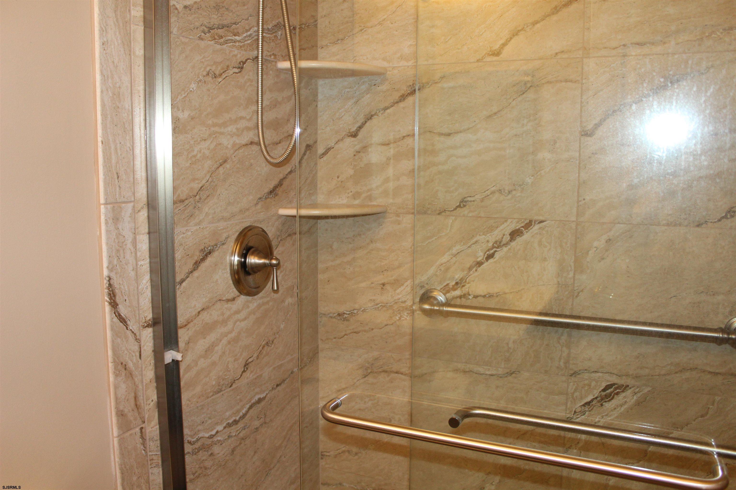 39 Poppy Road Egg Harbor Township, NJ 08234 - Photo 11 of 37 a bathroom with a shower