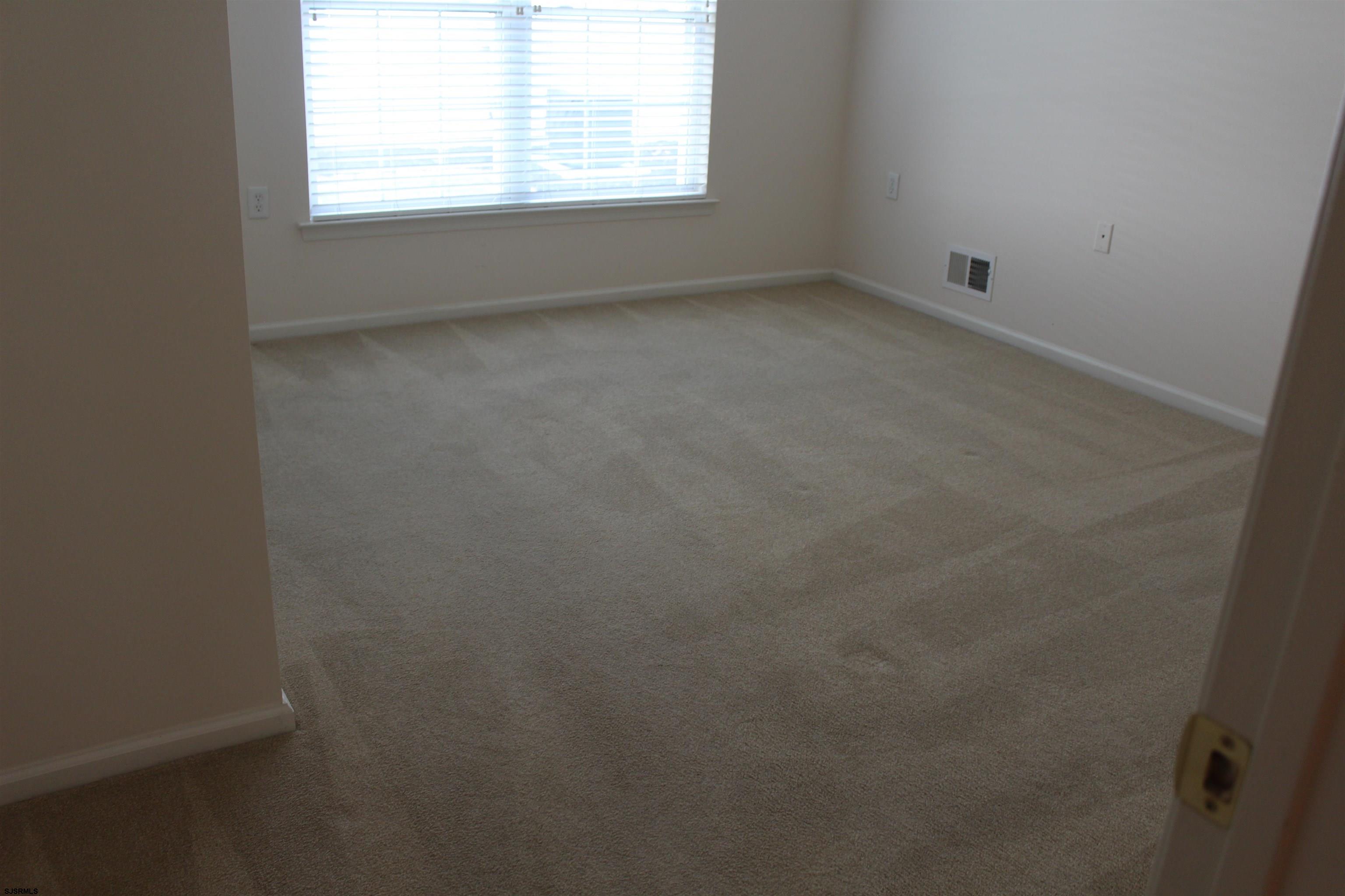 39 Poppy Road Egg Harbor Township, NJ 08234 - Photo 12 of 37 an empty room with a window