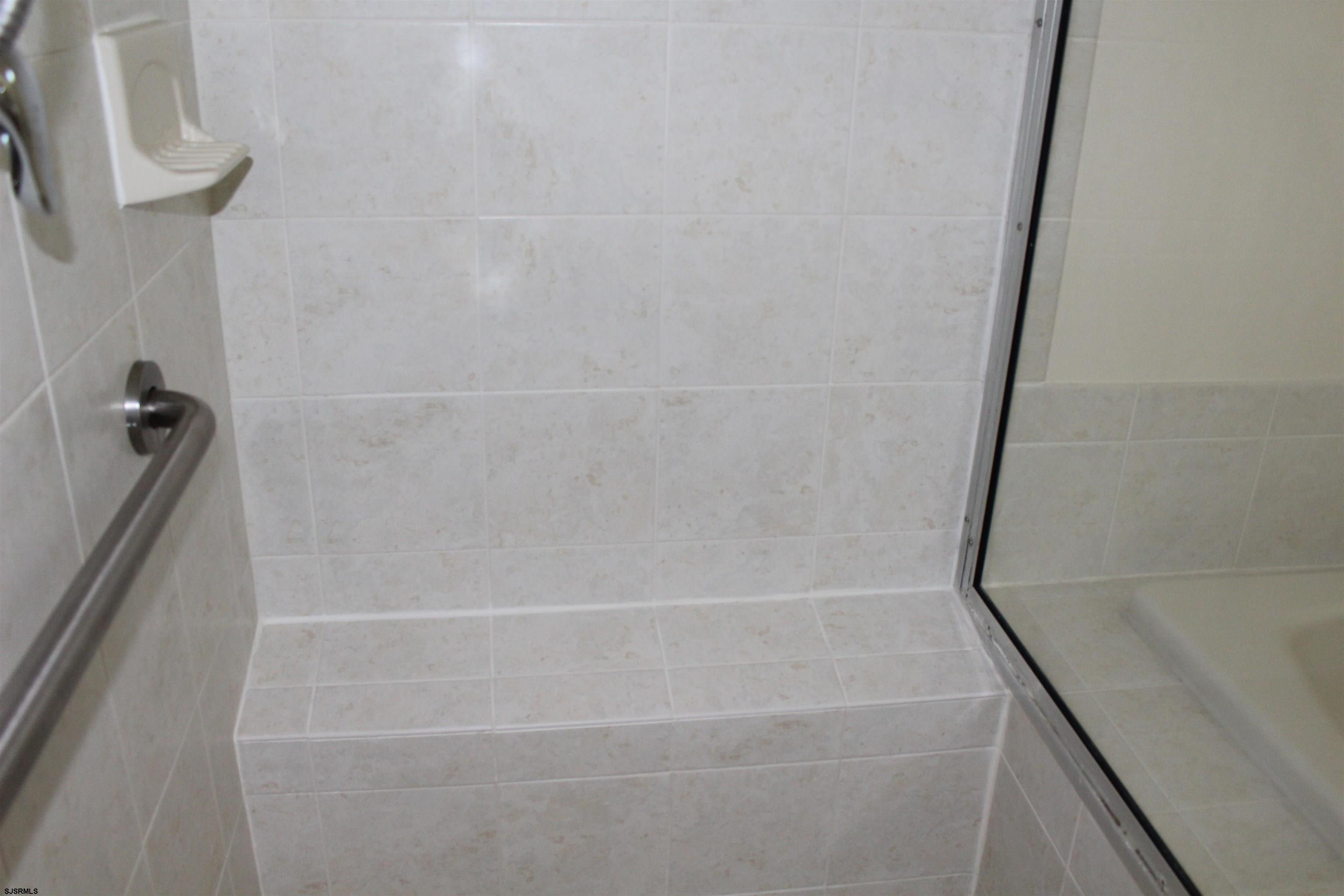 39 Poppy Road Egg Harbor Township, NJ 08234 - Photo 19 of 37 a bathroom with a shower