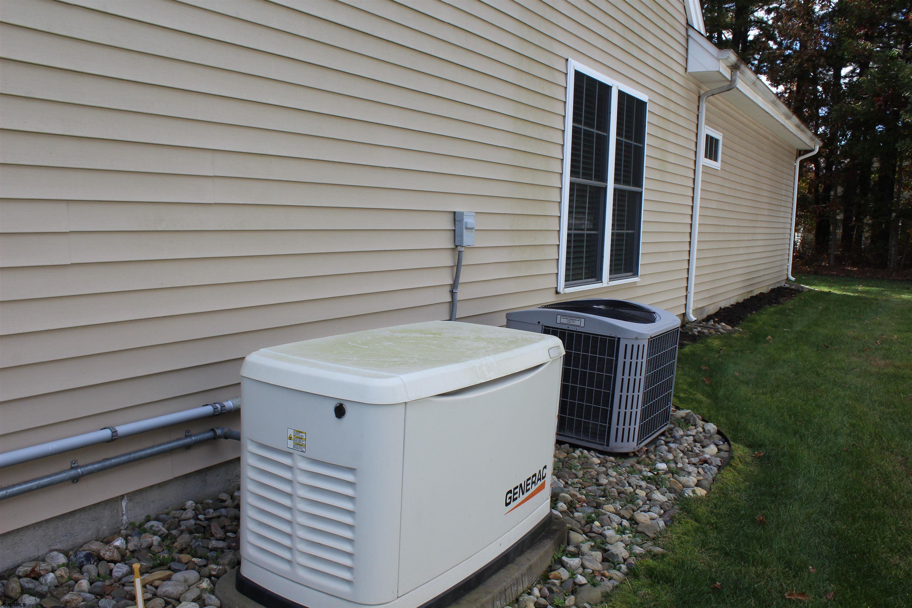 39 Poppy Road Egg Harbor Township, NJ 08234 - Photo 28 of 37 a view of a backyard with chairs