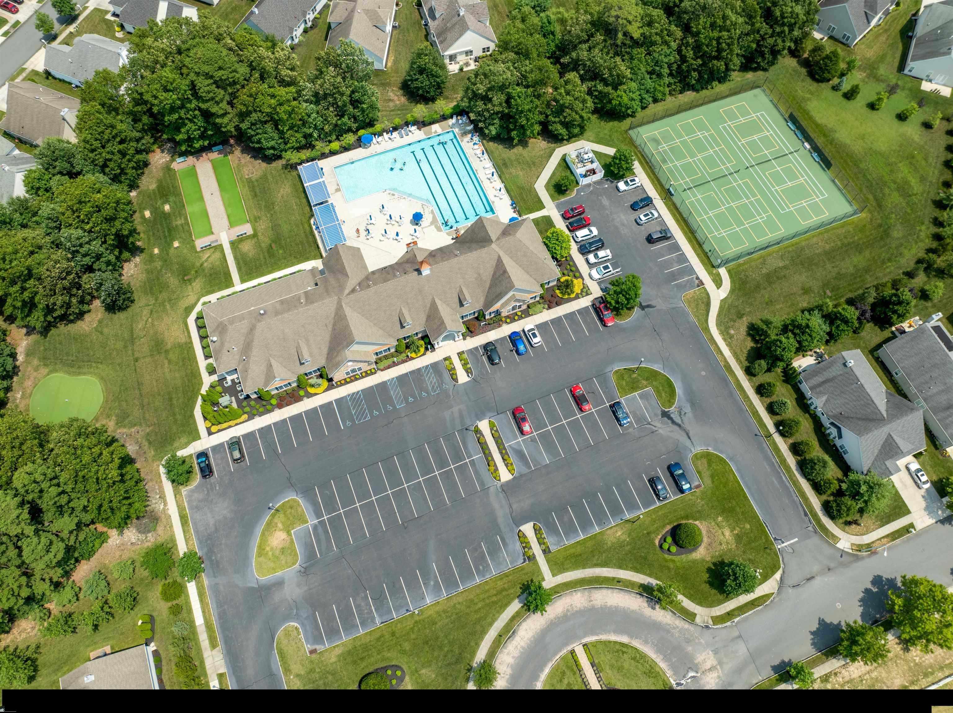 39 Poppy Road Egg Harbor Township, NJ 08234 - Photo 34 of 37 an aerial view of a house with a swimming pool
