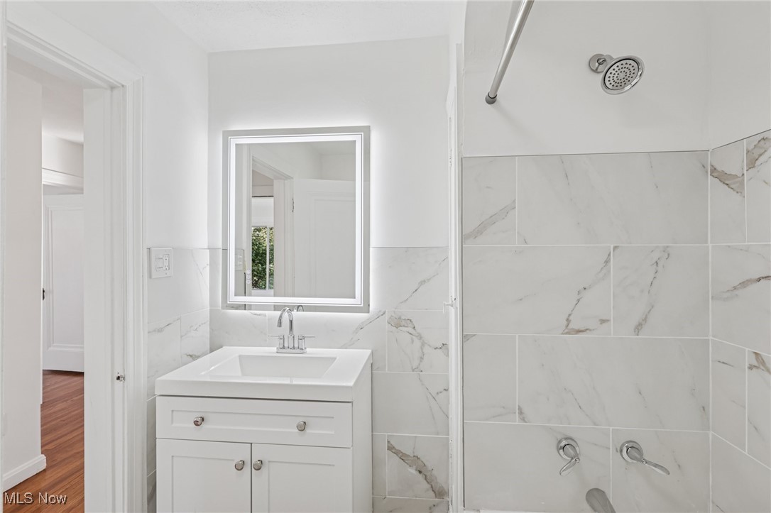 3621 Cedarbrook Road Cleveland, OH 44118 - Photo 29 of 40 Bathroom featuring vanity, ceramic tile floors, and a shower