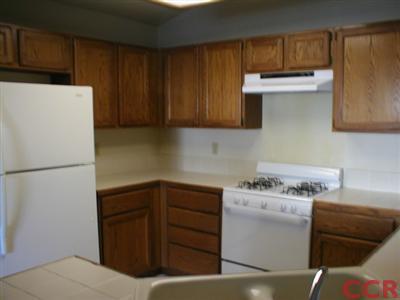 4325 Franklin Road Santa Maria, CA 93455 - Photo 8 of 9 a kitchen with a refrigerator and a stove top oven