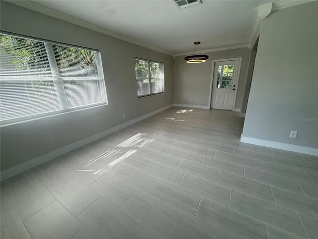 an empty room with windows