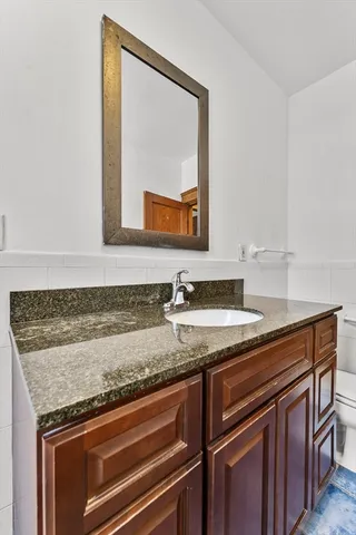 a view of a sink and mirror