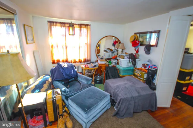 a group of people sitting in a living room