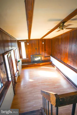 a view of swimming pool with seating space