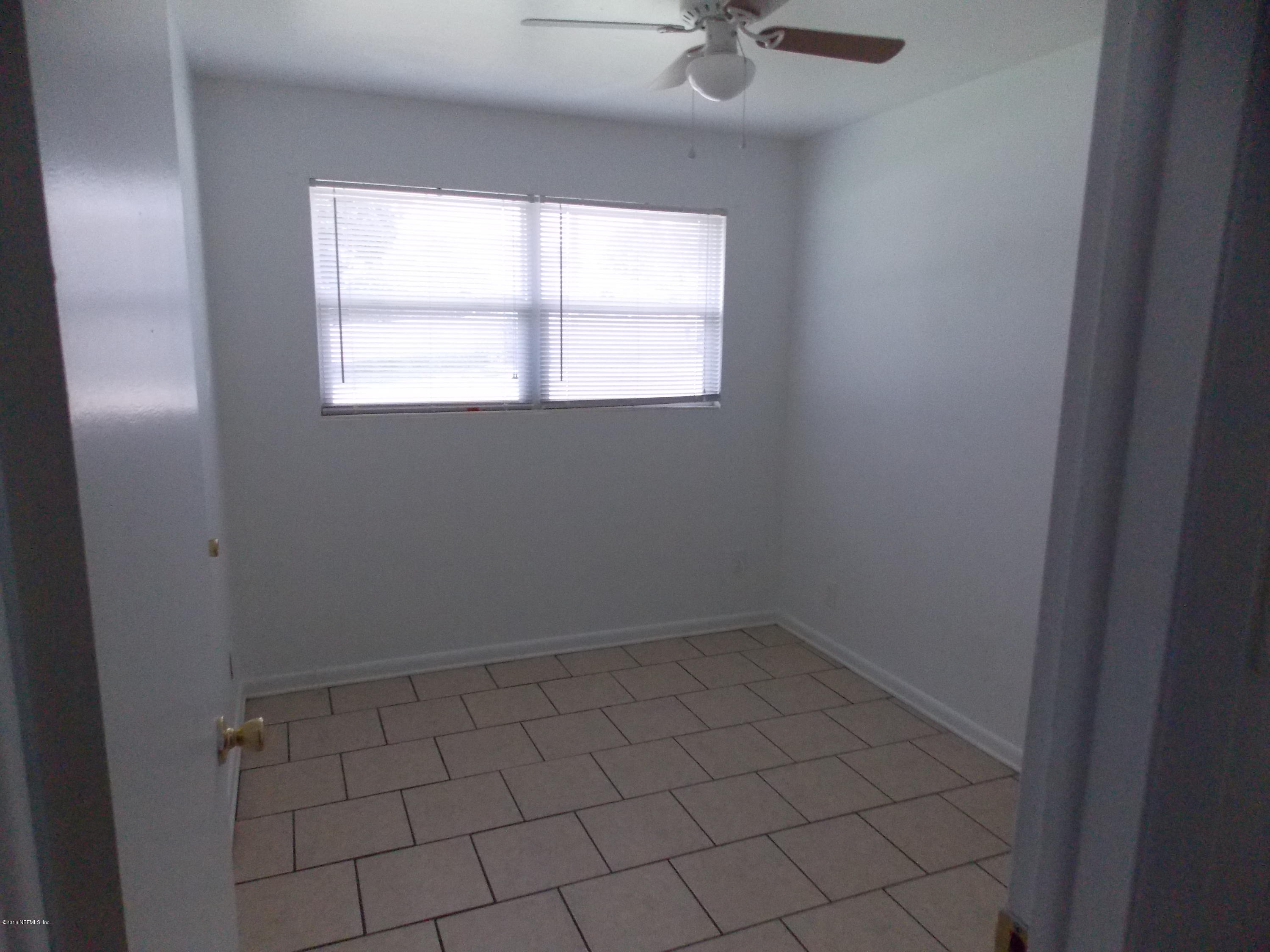 1935 Fouraker Road Jacksonville, FL 32210 - Photo 10 of 11 Front Middle Bedroom
