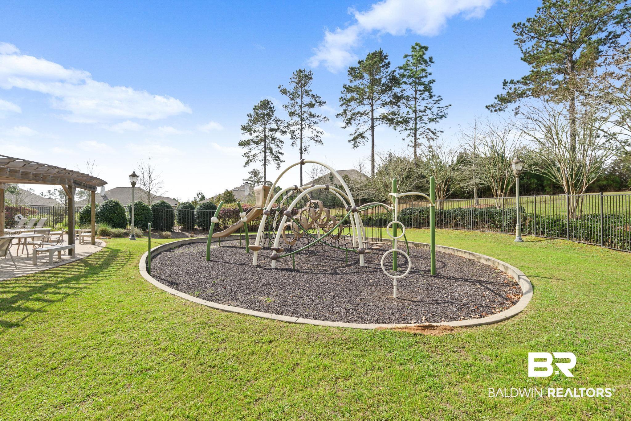 12693 Waxwing Avenue Daphne, AL 36527 - Photo 38 of 43 Community play area featuring a pergola and a patio area