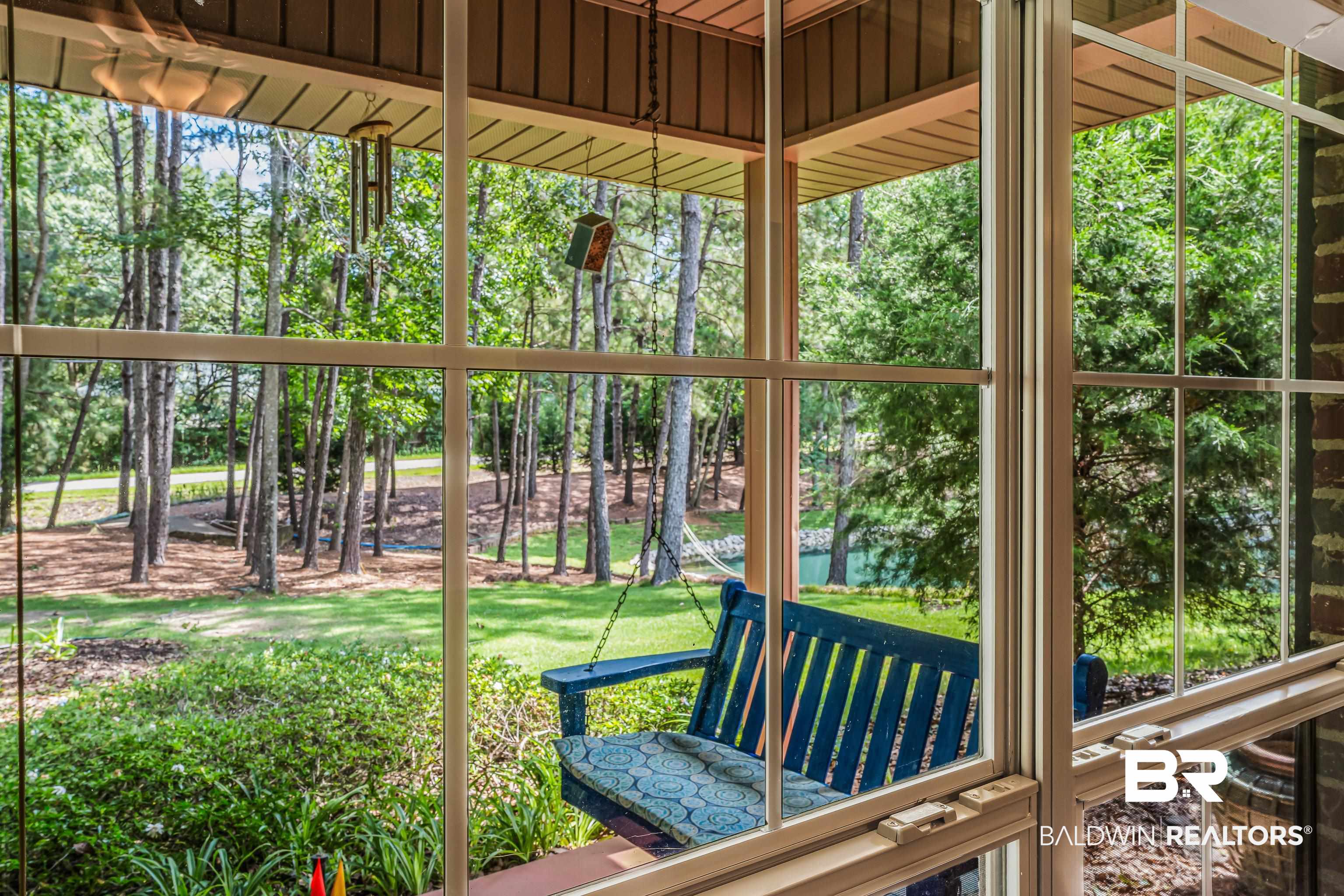 7014 Blakeley Road Daphne, AL 36527 - Photo 41 of 45 Expansive outdoor space featuring mature trees and a visible body of water