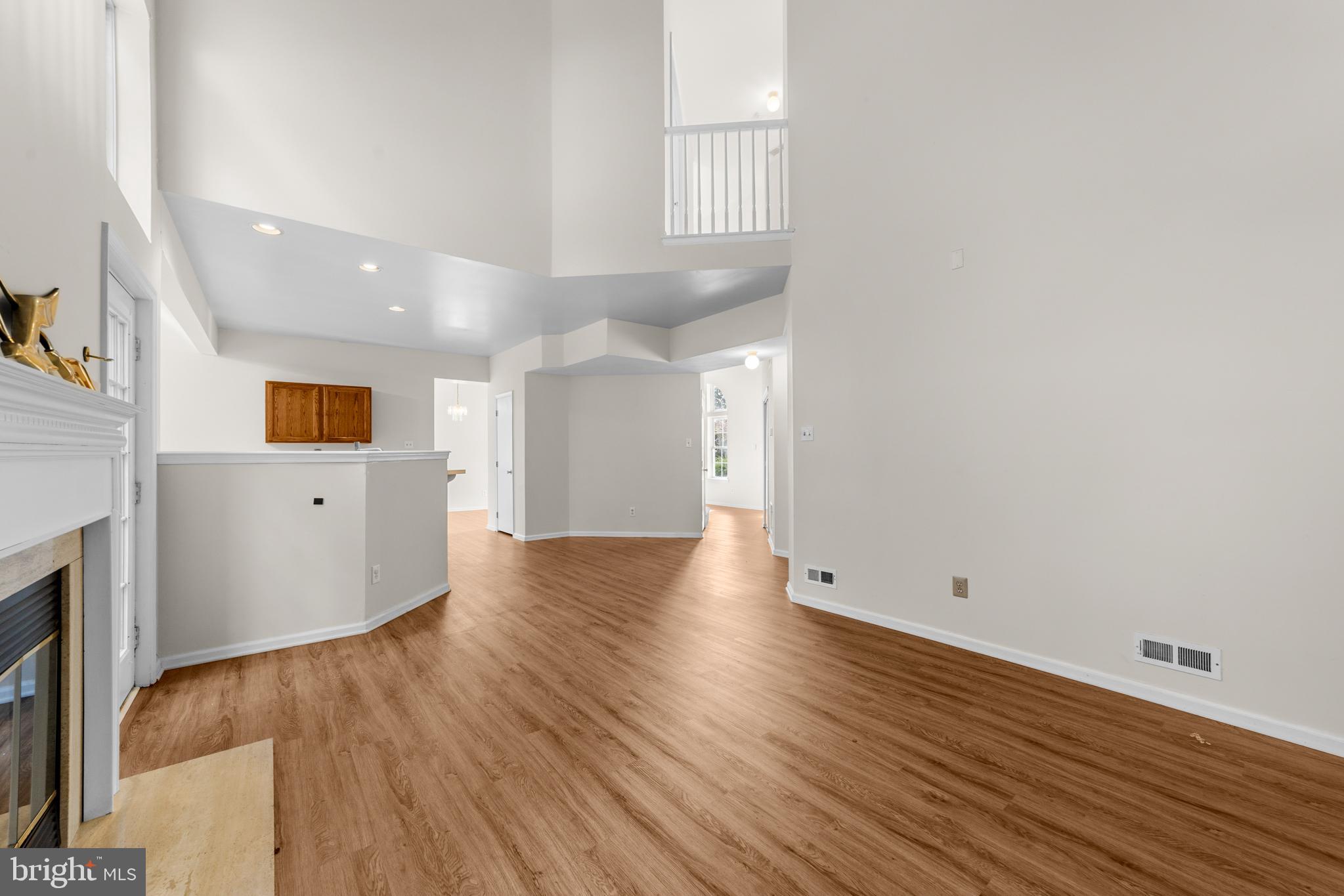 50 Wildcat Branch Drive Sicklerville, NJ 08081 - Photo 14 of 33 a view of a kitchen with wooden floor and a window