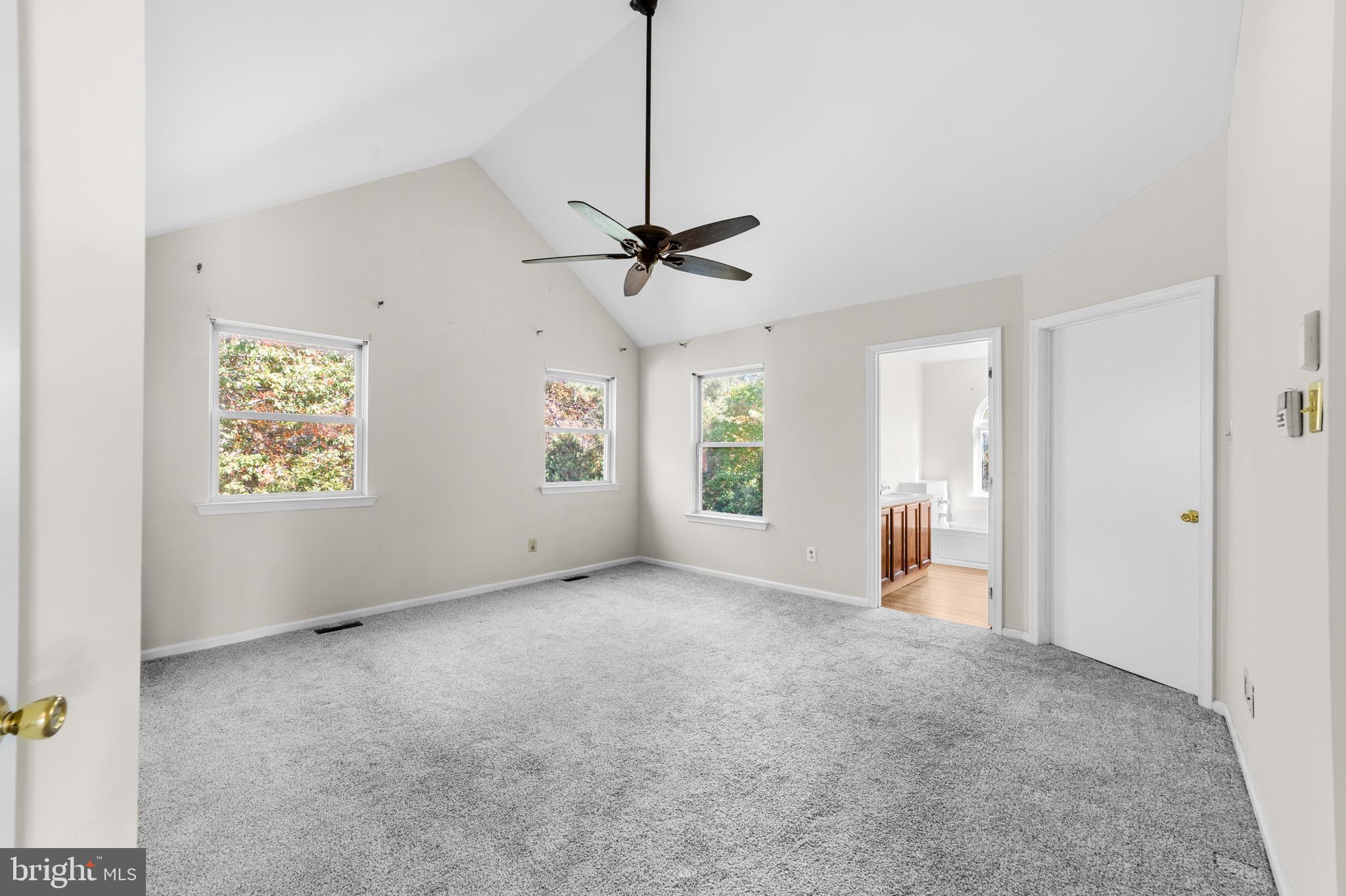 50 Wildcat Branch Drive Sicklerville, NJ 08081 - Photo 23 of 33 a view of a livingroom with a window and a ceiling fan