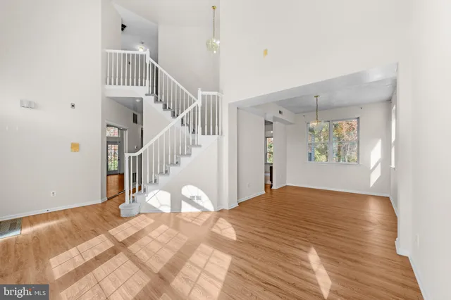 a view of a livingroom with wooden floor