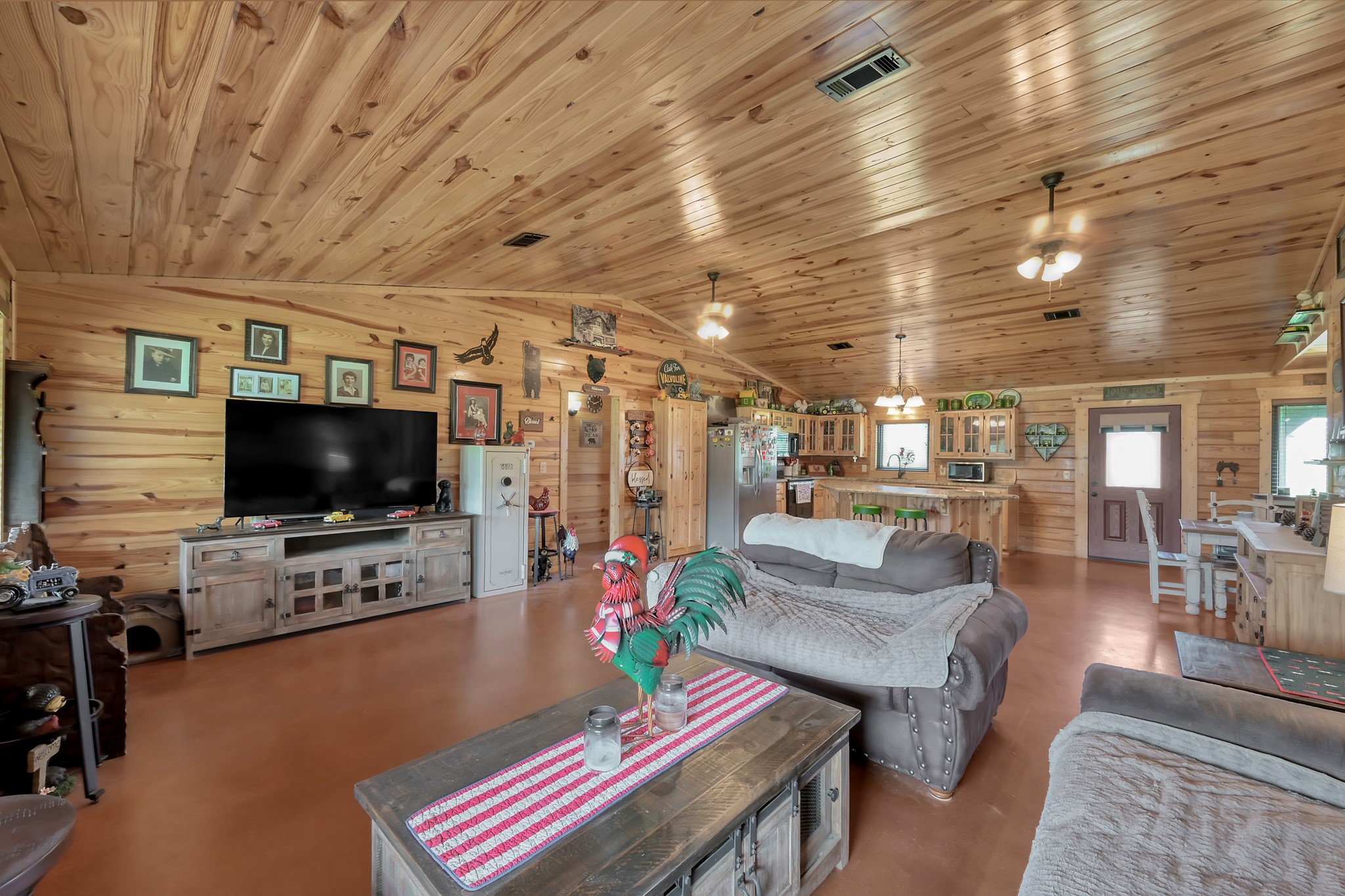 130 Raleigh Circle Trinity, TX 75862 - Photo 6 of 19 a living room with furniture and a flat screen tv