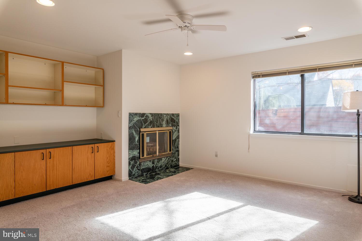 2100 South Bay Lane Reston, VA 20191 - Photo 14 of 43 Family Room with Double-sided Fireplace