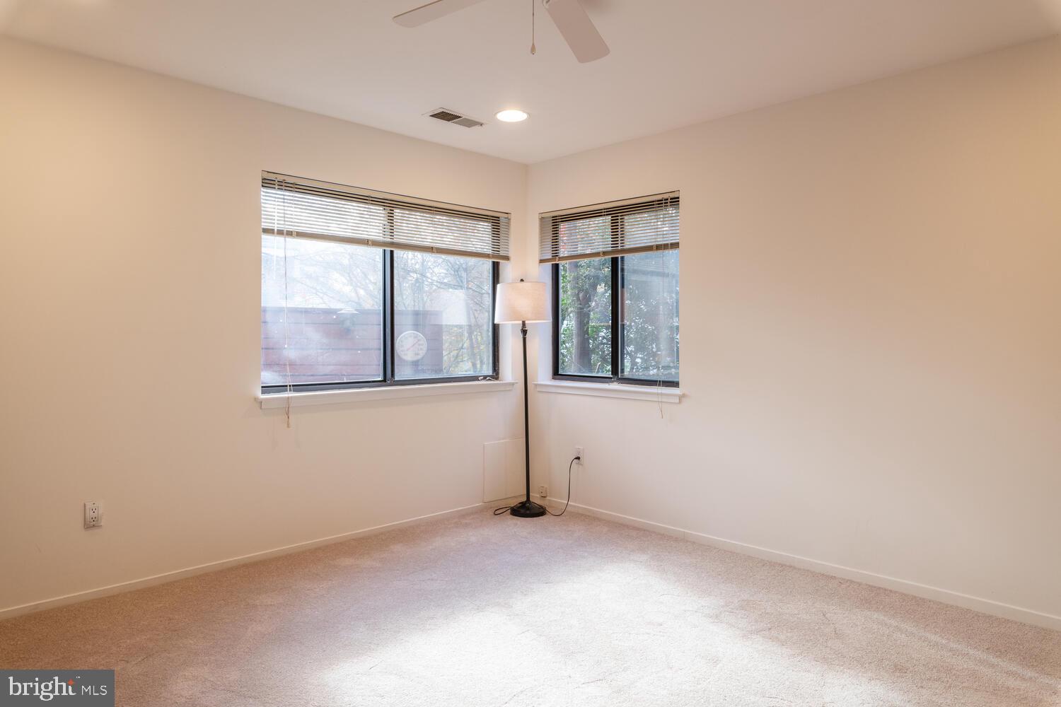 2100 South Bay Lane Reston, VA 20191 - Photo 16 of 43 Corner Family Room Windows Overlooking Rear Yard
