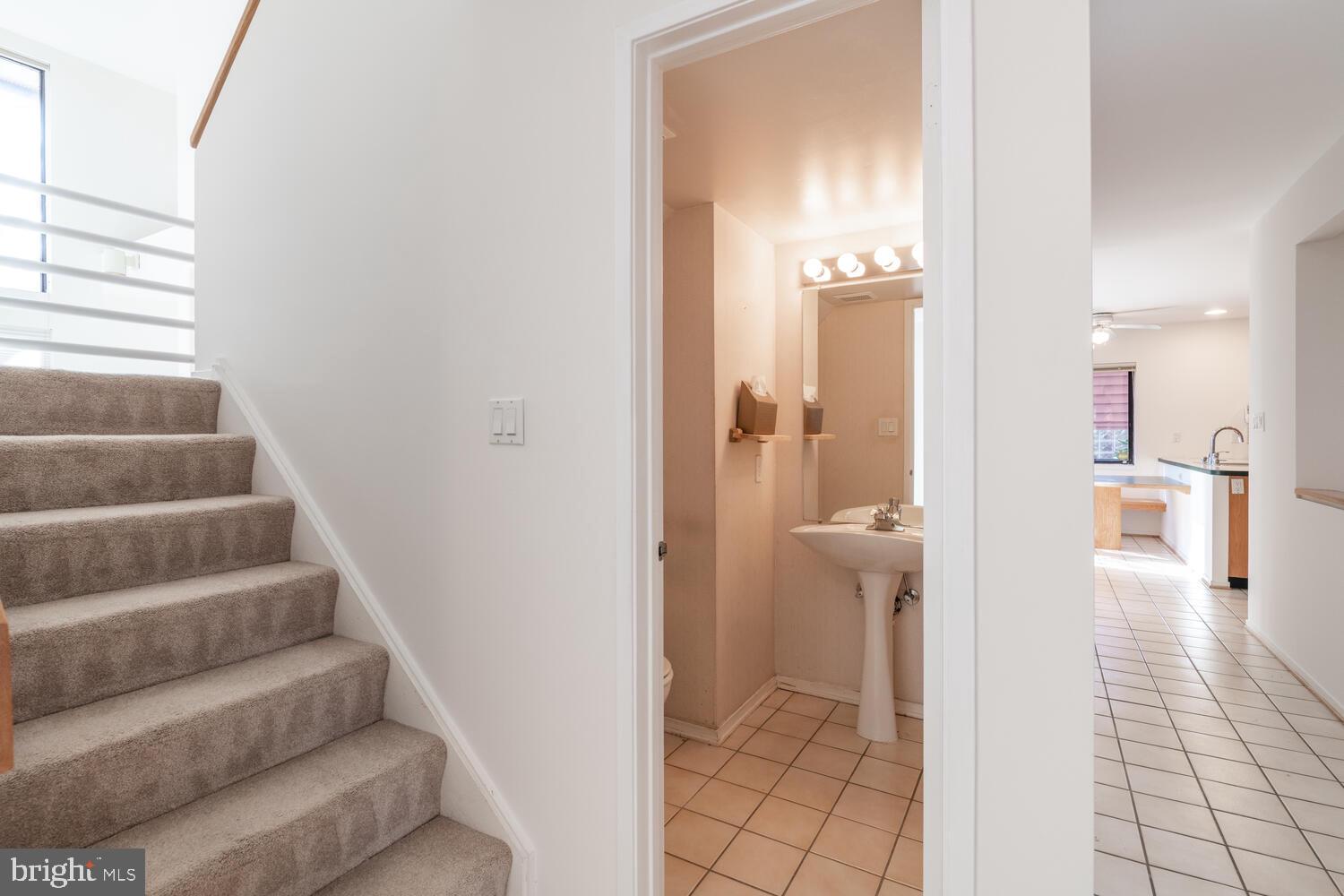 2100 South Bay Lane Reston, VA 20191 - Photo 19 of 43 Open Staircase to Upper Level