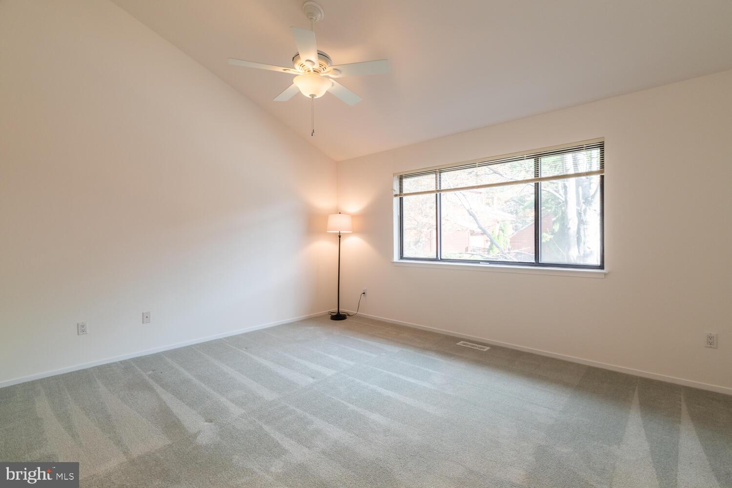 2100 South Bay Lane Reston, VA 20191 - Photo 21 of 43 Master Bedroom with Ceiling Fan and Triple Windows