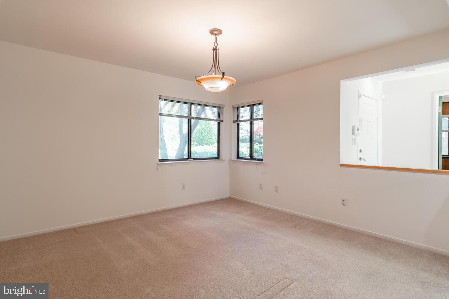 2100 South Bay Lane Reston, VA 20191 - Photo 9 of 43 Dining Room with Corner Windows at Entry Area
