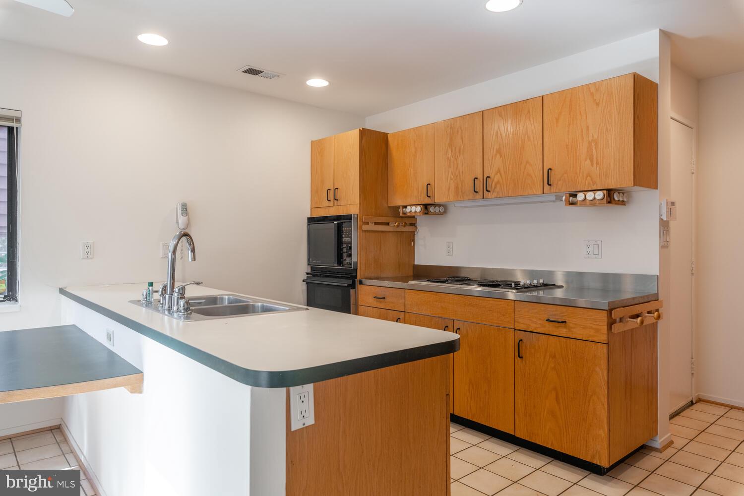 2100 South Bay Lane Reston, VA 20191 - Photo 10 of 43 Open Kitchen with Original Retro Cabinetry