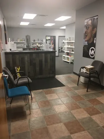 a living room with a couch and a stove top oven
