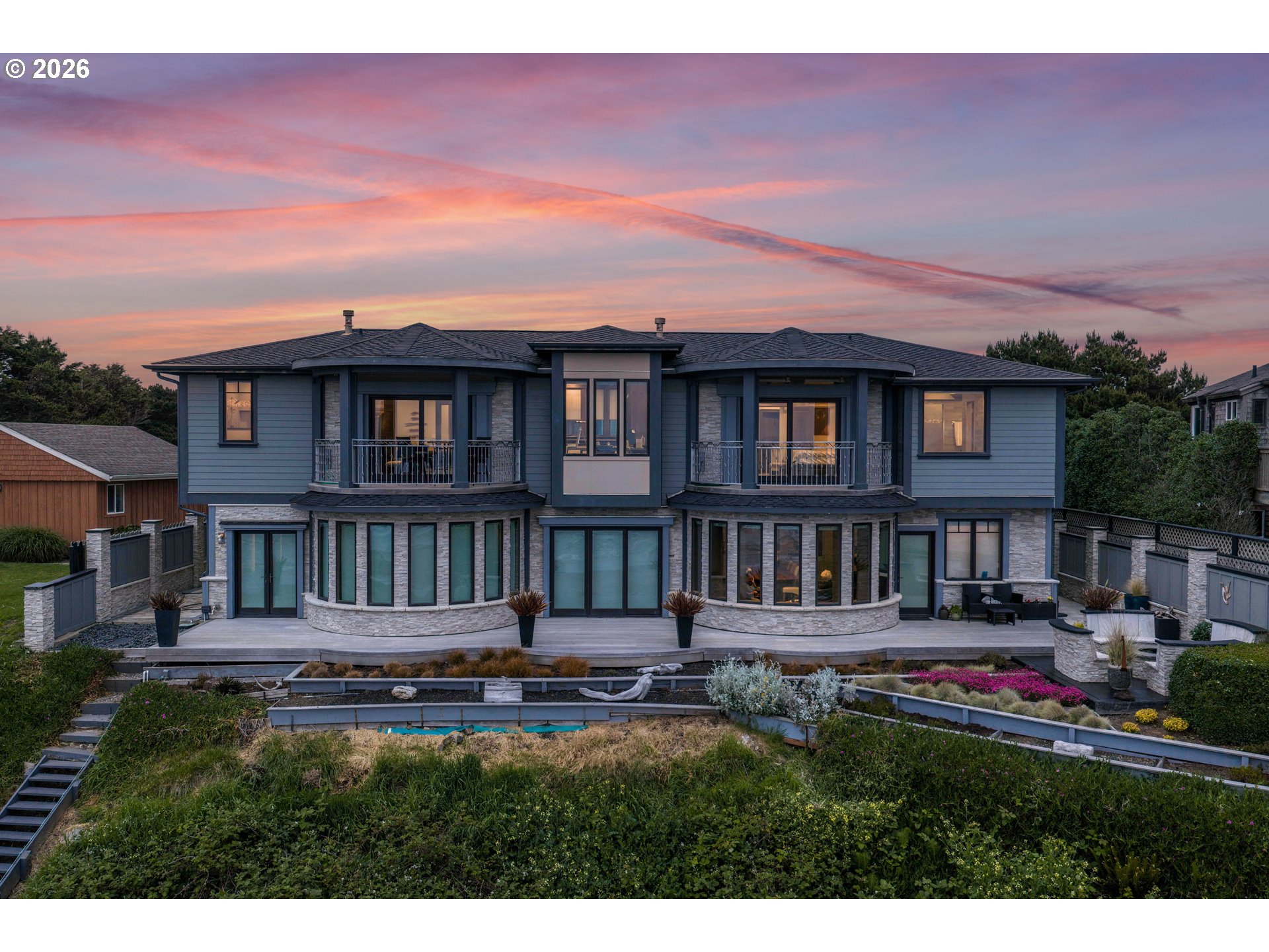 2488 Beach Loop Road Bandon, OR 97411 - Photo 5 of 48 a house view with swimming pool and garden space