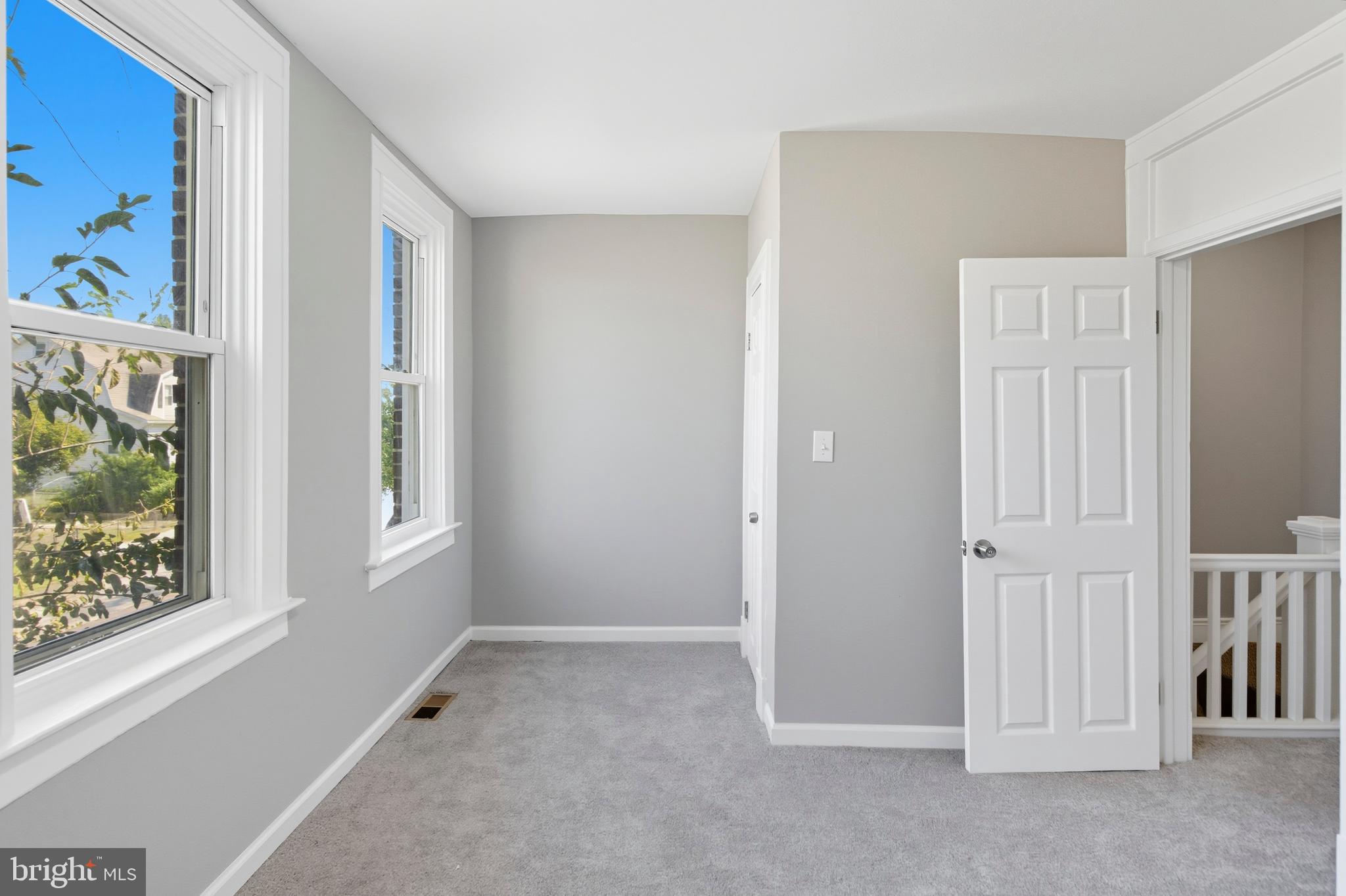 809 East Pontiac Avenue Baltimore, MD 21225 - Photo 24 of 36 an empty room with windows
