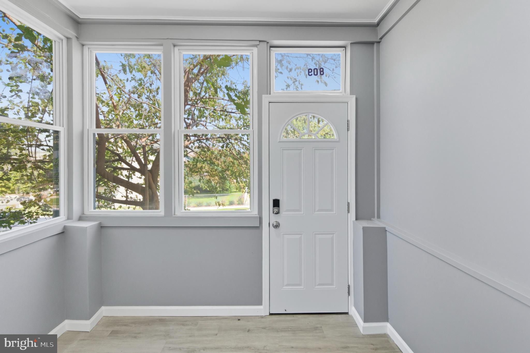 809 East Pontiac Avenue Baltimore, MD 21225 - Photo 4 of 36 a view of front door with window