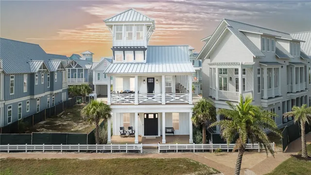 a front view of a house with swimming pool
